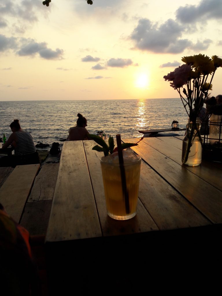 Sunset from a bar That's not my drink, it's Jess's.